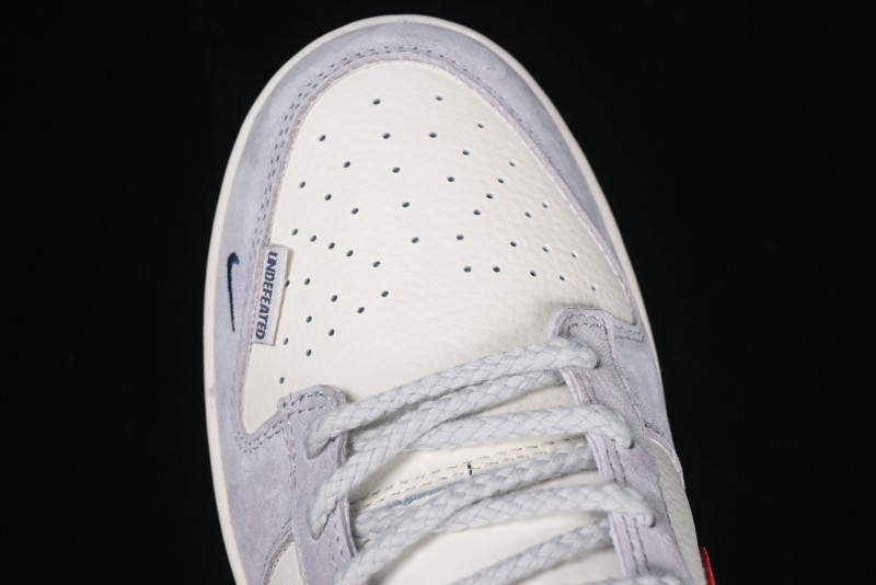 Nike SB Dunk Low UN Collaboration Anniversary Edition Custom Lifestyle Sneakers with Black Swoosh and Gum Sole - DM6868-032