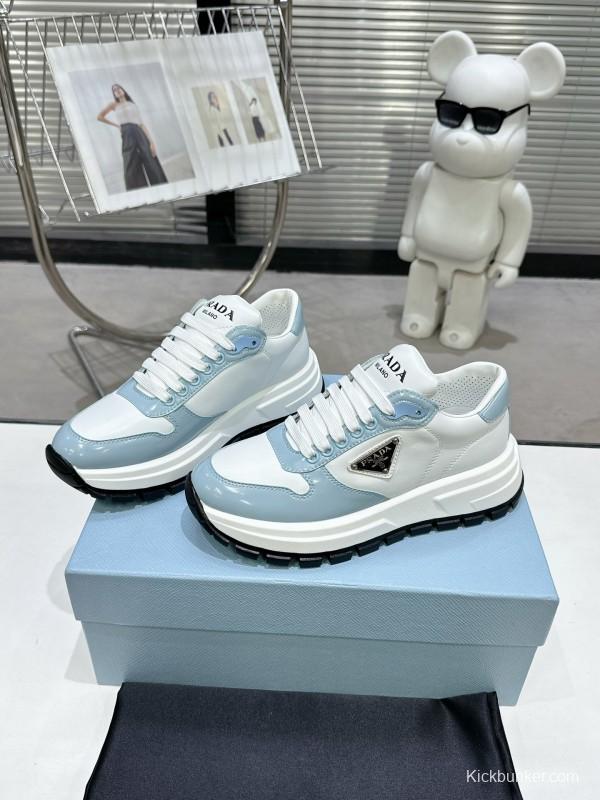 2025 Women Prada Light Blue White Leather Sneakers KFY00310