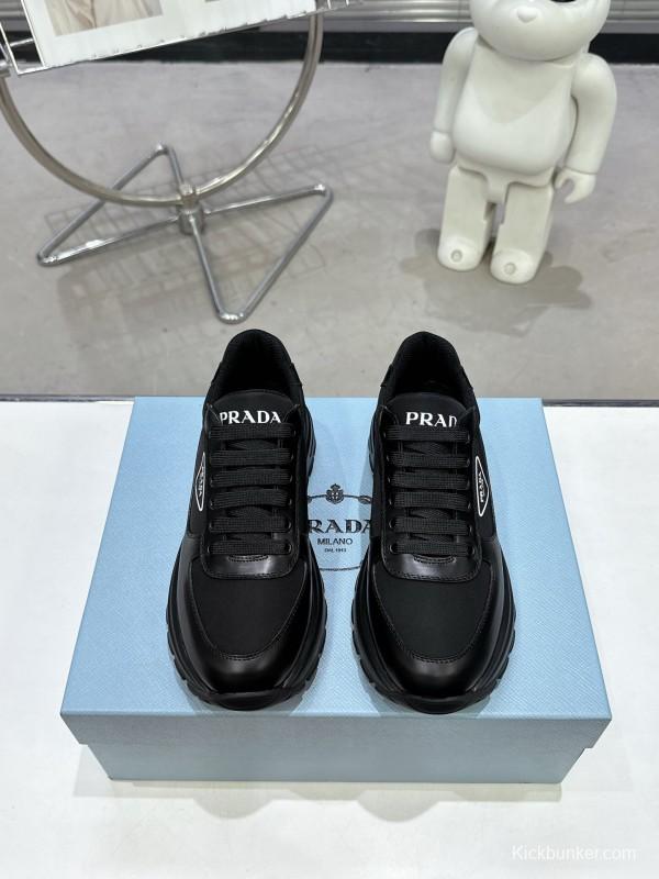 2025 Unisex Prada Black Leather Sneakers KFY00310