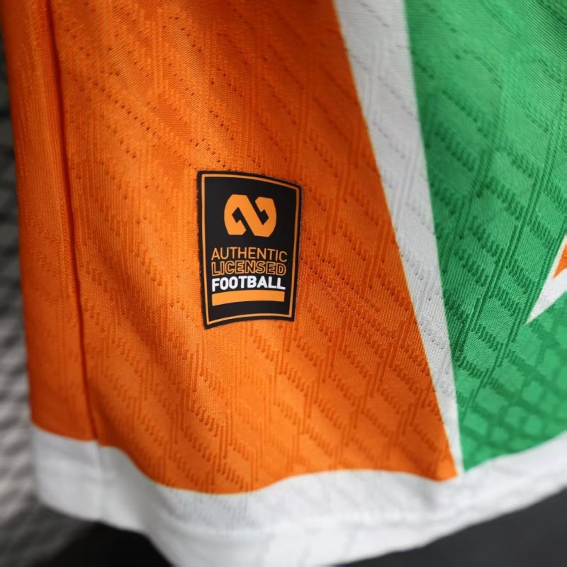 Player Version 2025 Ivory Coast Green with Elephant Graphic and Orange Trim Jersey