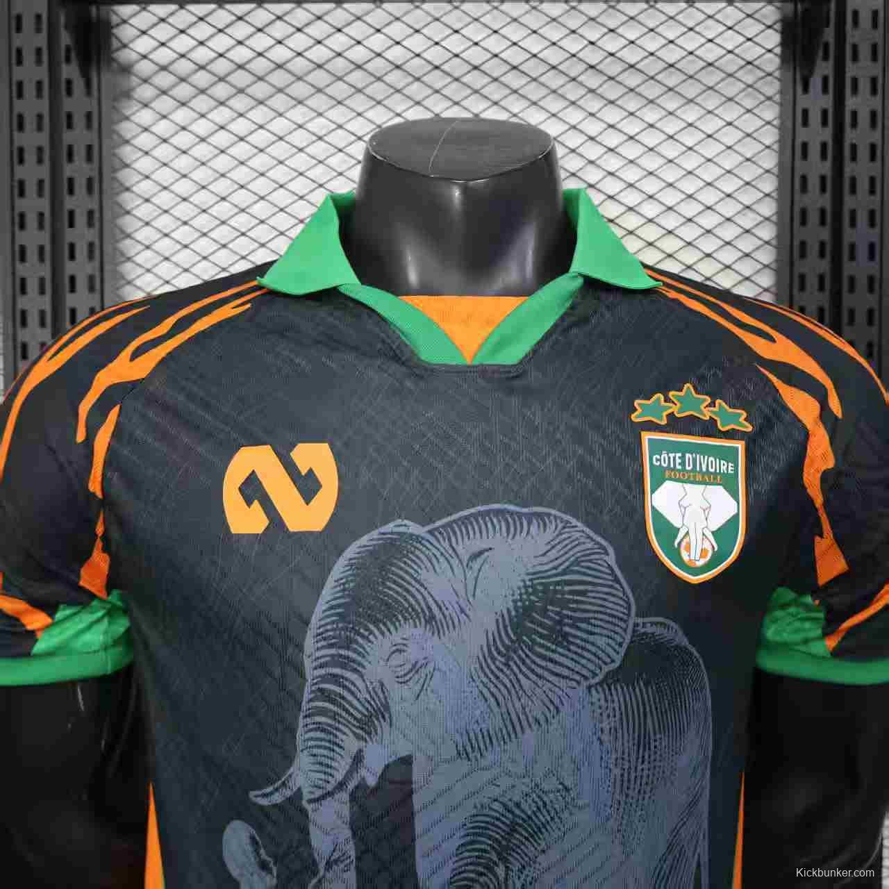 Player Version 2025 Ivory Coast Black with Elephant Graphic and Orange Stripes Jersey