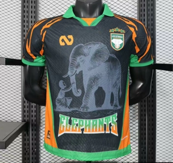 Player Version 2025 Ivory Coast Black with Elephant Graphic and Orange Stripes Jersey